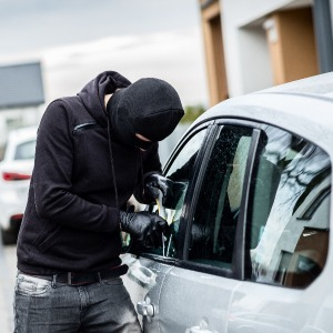 Car Theft Man in Gloves - LotGuard